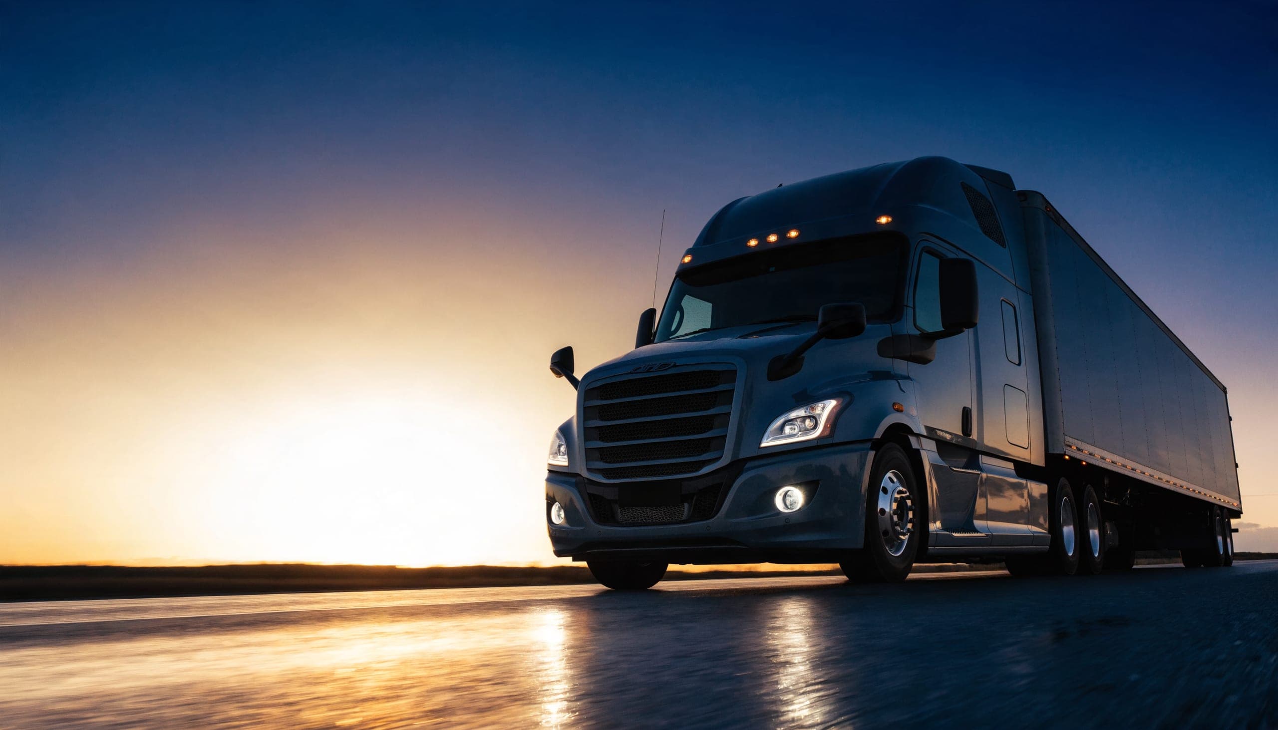 Freightliner semi-truck on the highway — SureLoadr carrier vetting for brokers and shippers
